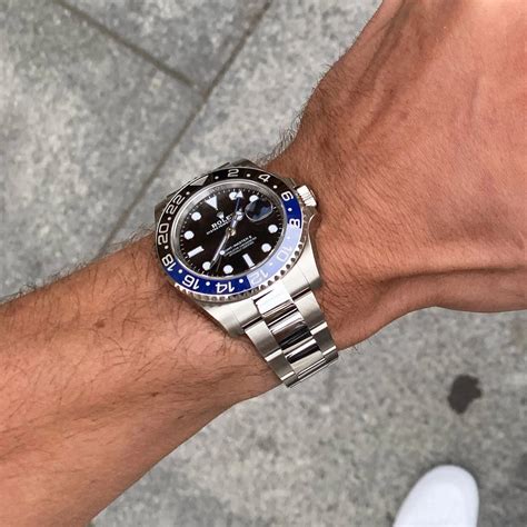 wearing rolex batman gmt.